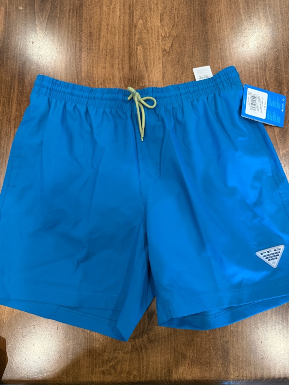 Columbia Bright Blue Men's Swim Trunks 6 inch length.